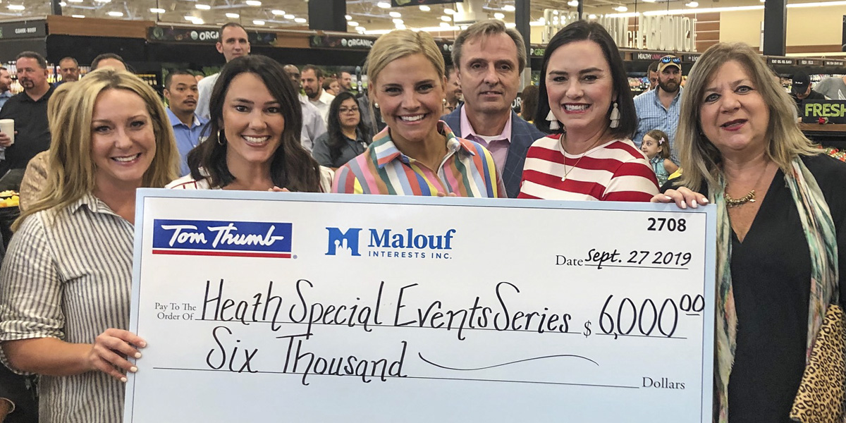 Tom Thumb presents check to The Heath Special Events Board