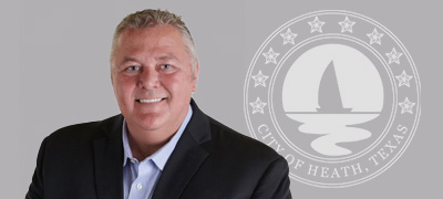 Headshot of Council member Scott Dodson in a black suit.